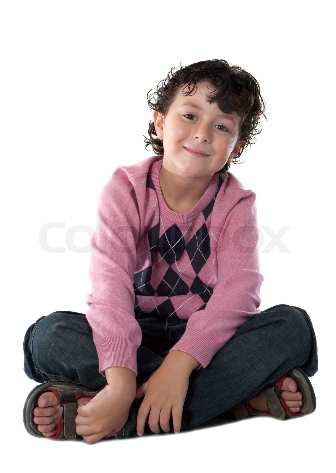 Happy child sitting | Stock image | Colourbox