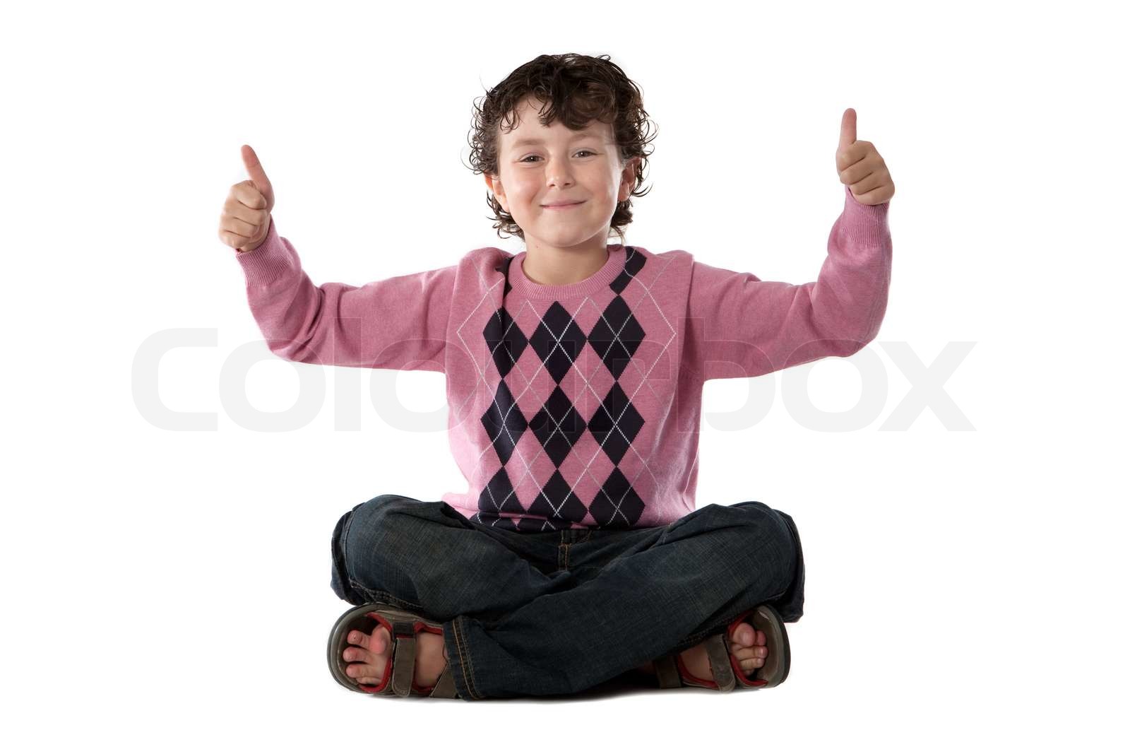 Happy child sitting | Stock image | Colourbox
