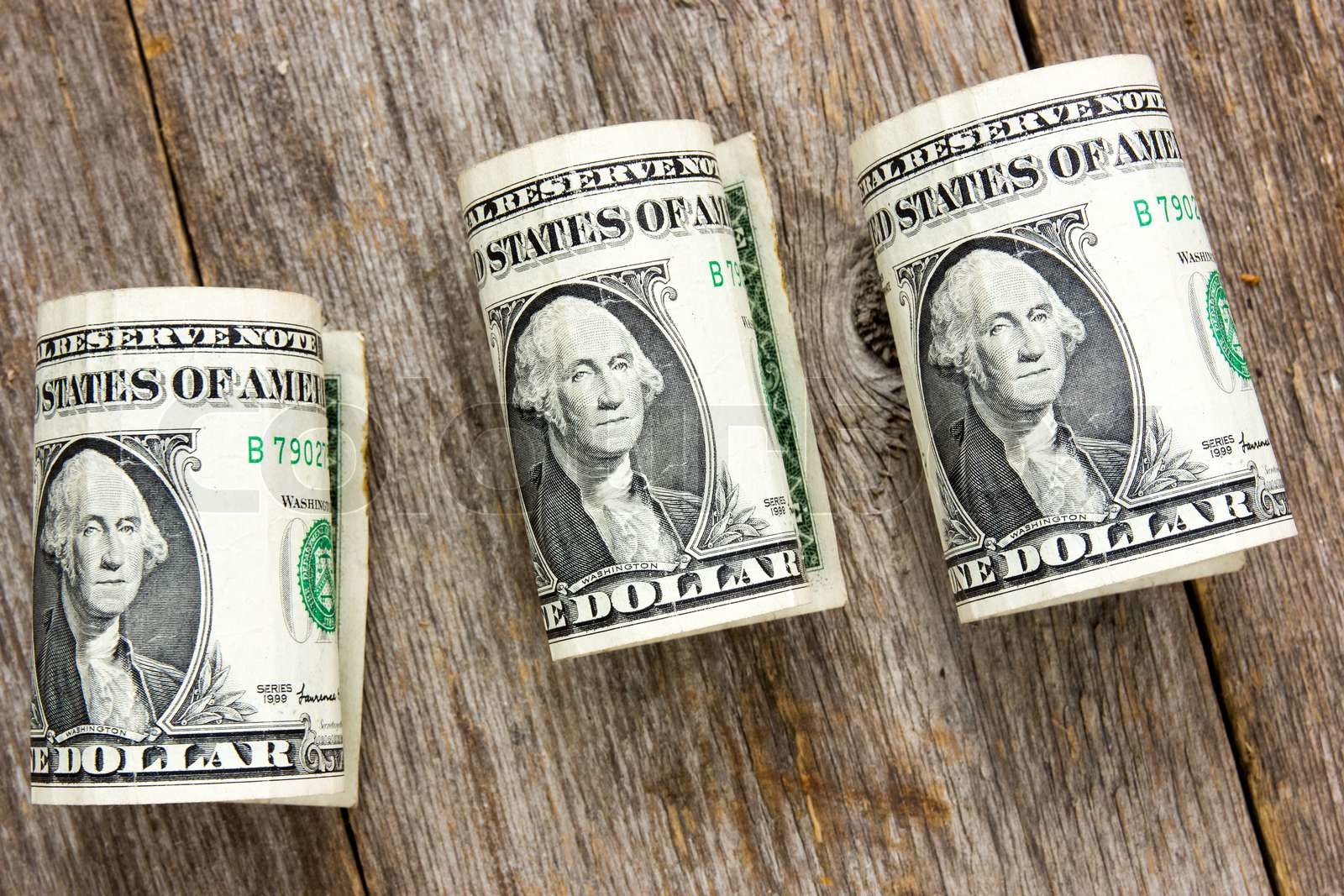 Rolled up dollar bills Stock image Colourbox