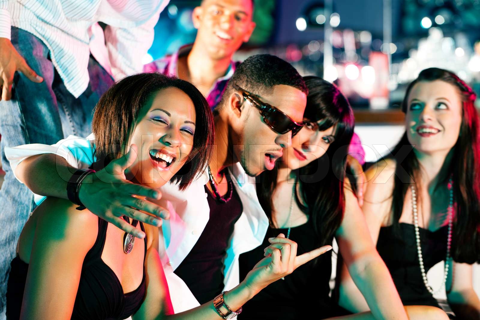 Group of friends in nightclub | Stock image | Colourbox