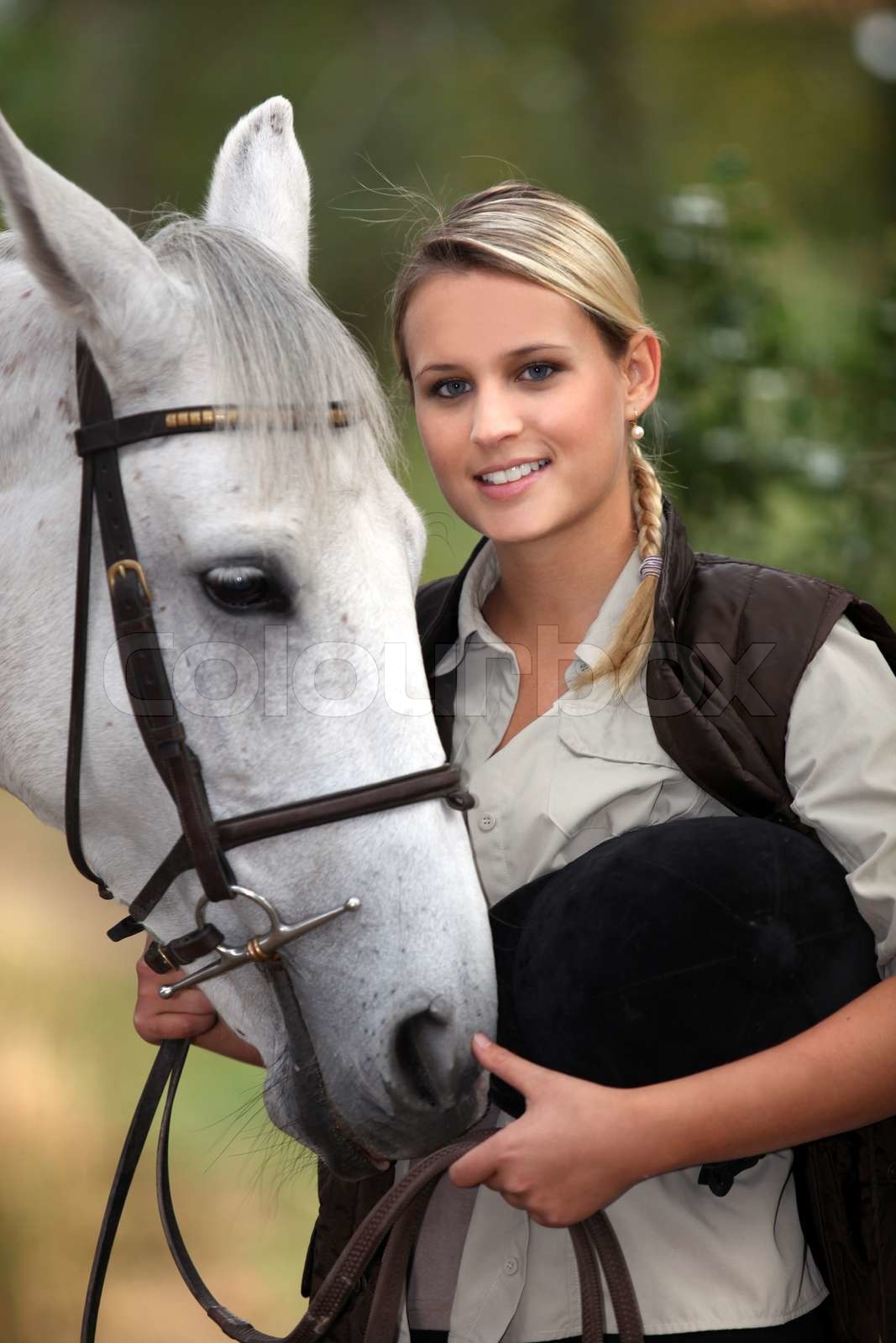 Horse and rider Stock image Colourbox