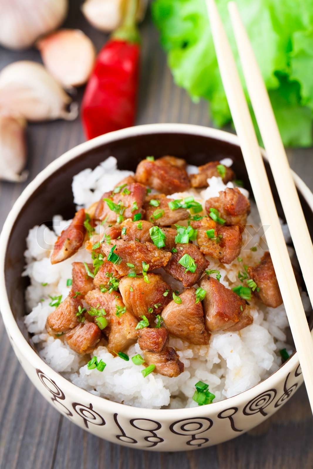 Bowl of rice with meat | Stock image | Colourbox