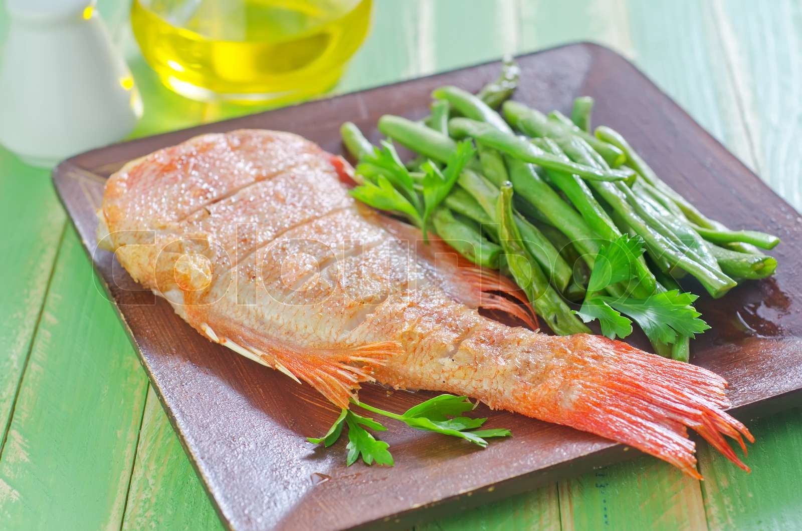 fried fish with green beans | Stock image | Colourbox