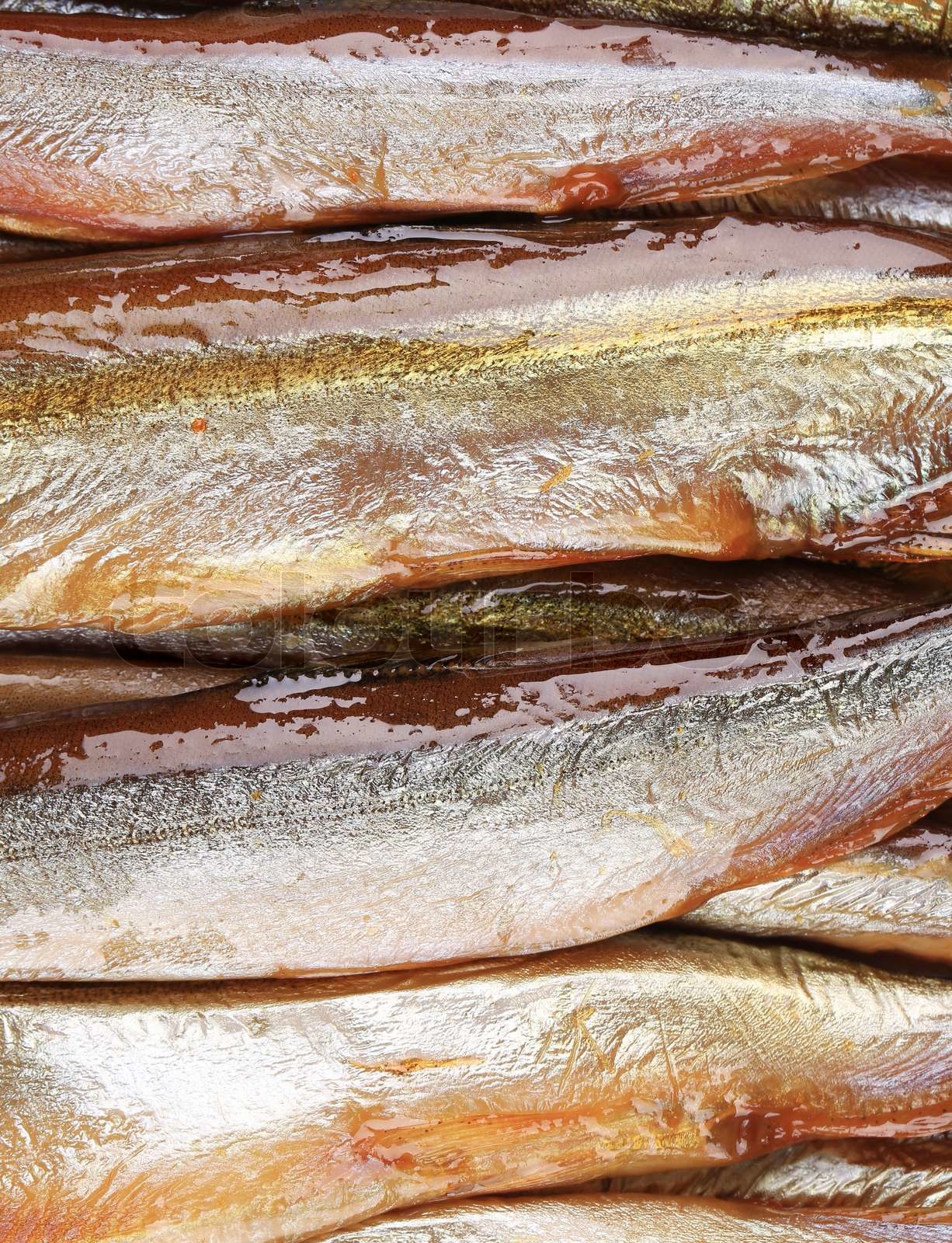 Smokedried fish close up. Stock image Colourbox