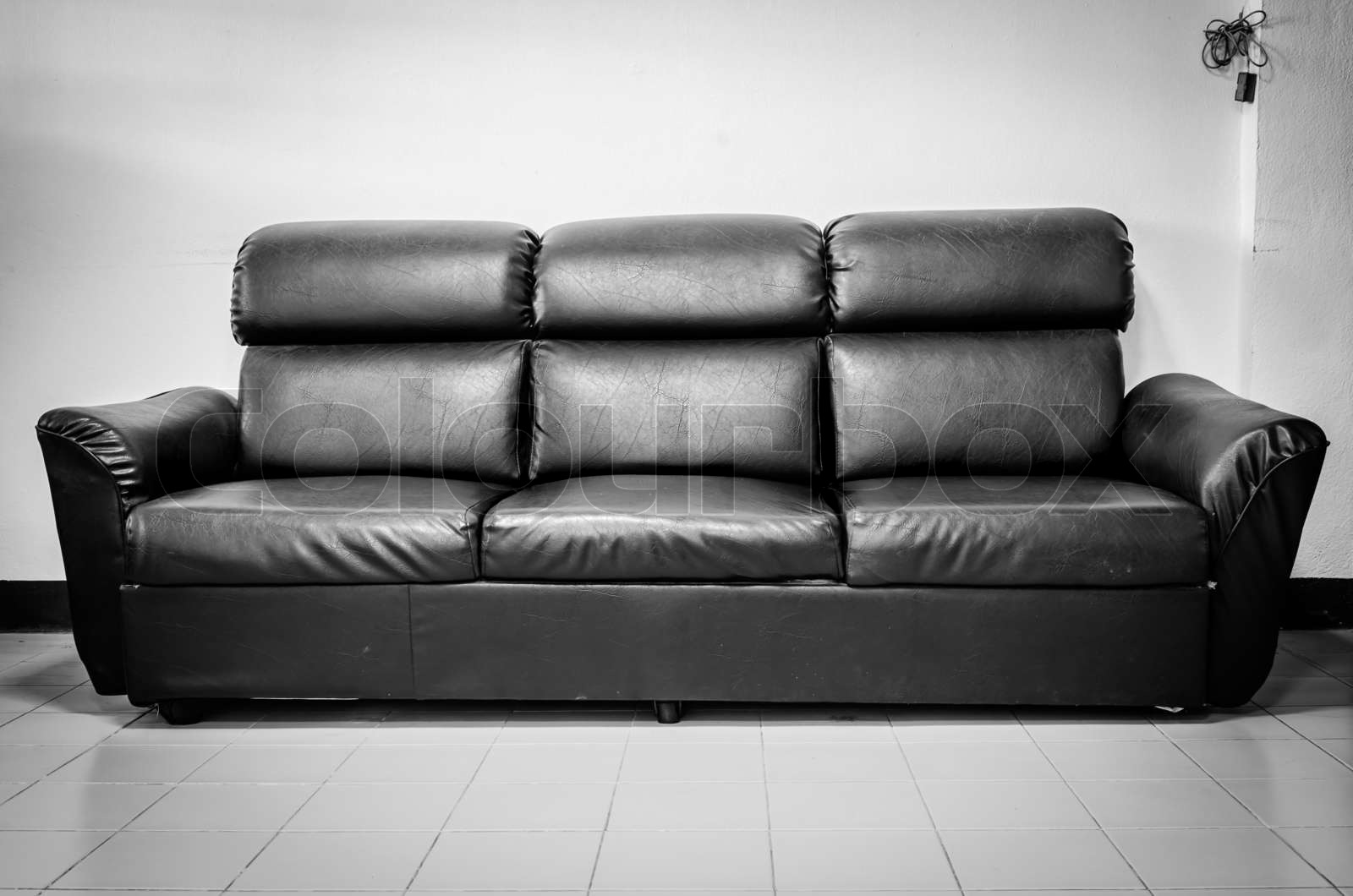 Black leather sofa | Stock image | Colourbox