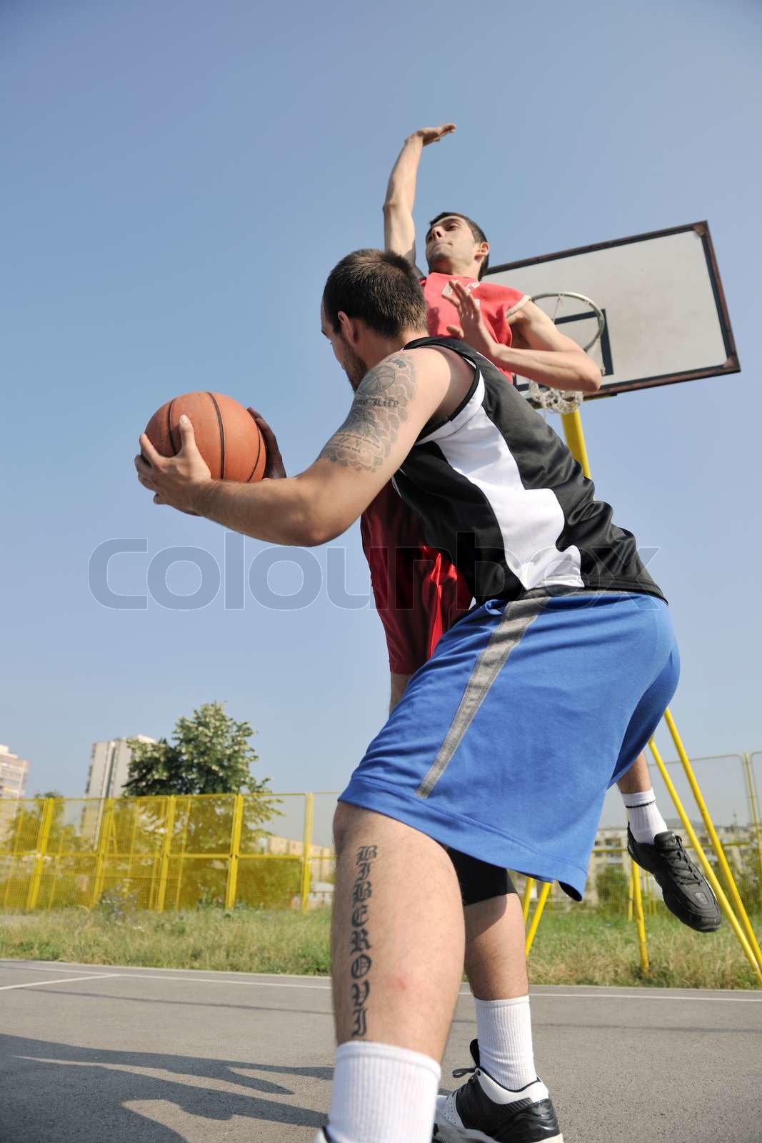streetball game at early morning | Stock image | Colourbox
