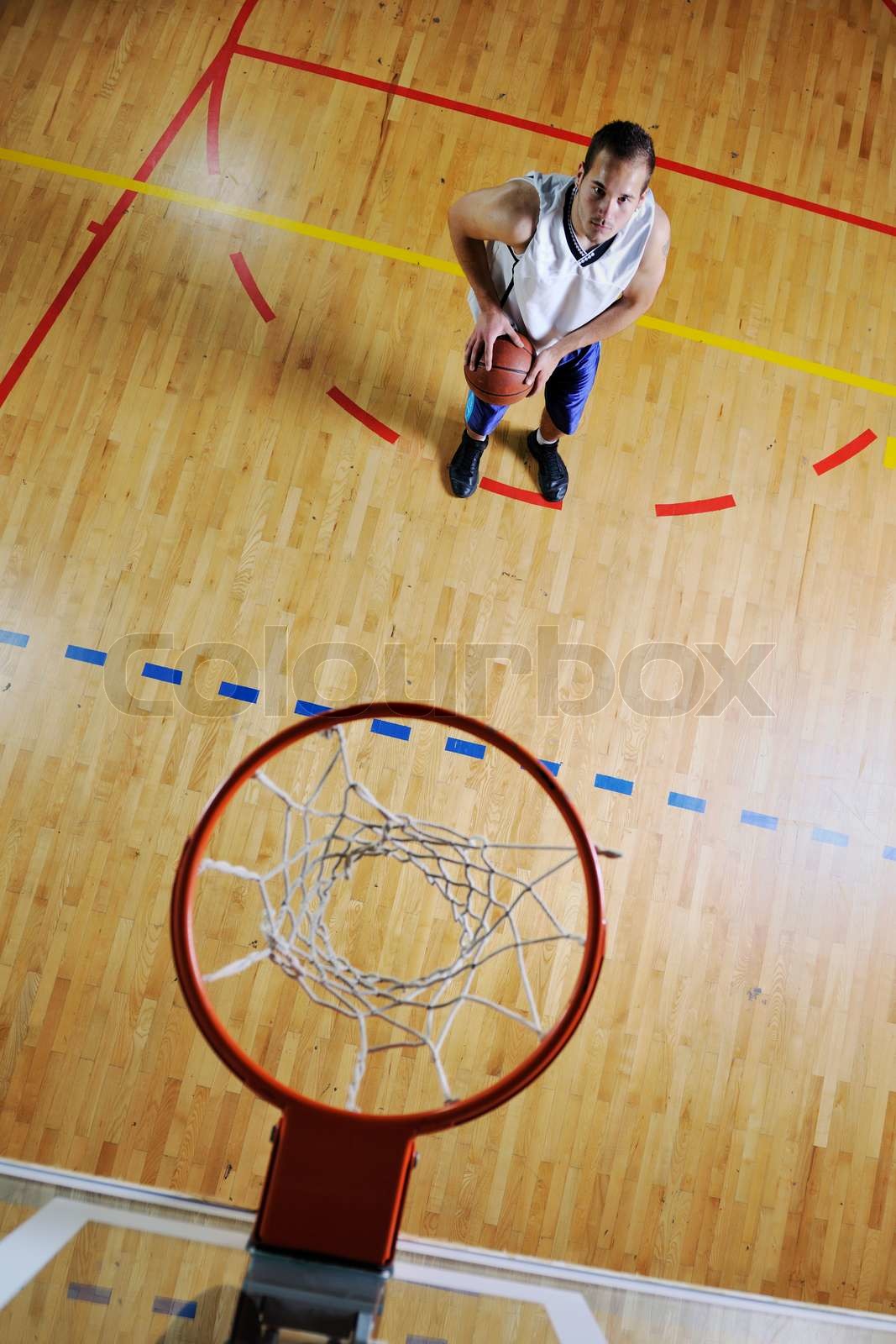 basketball player shooting | Stock image | Colourbox