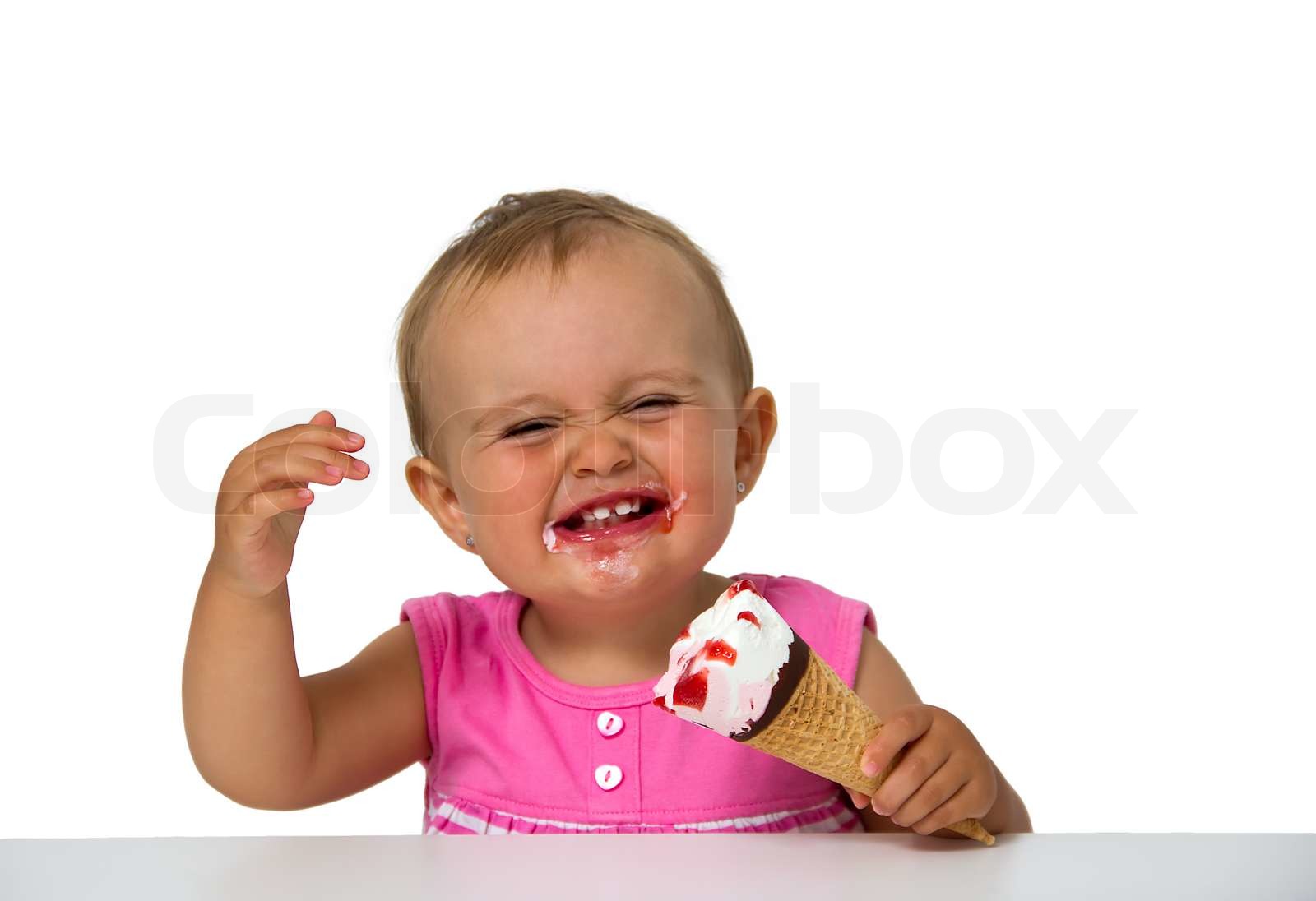 baby eating ice cream Stock image Colourbox