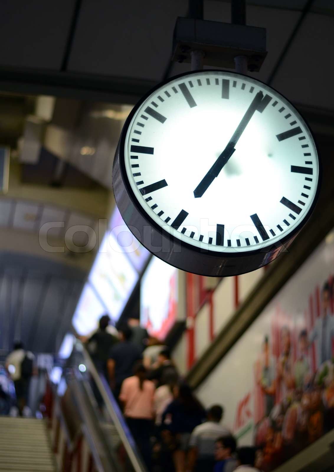 Public clock in railway station Stock image Colourbox