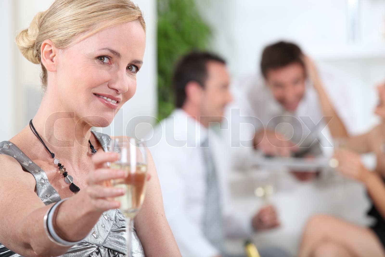 woman toasting Stock image Colourbox