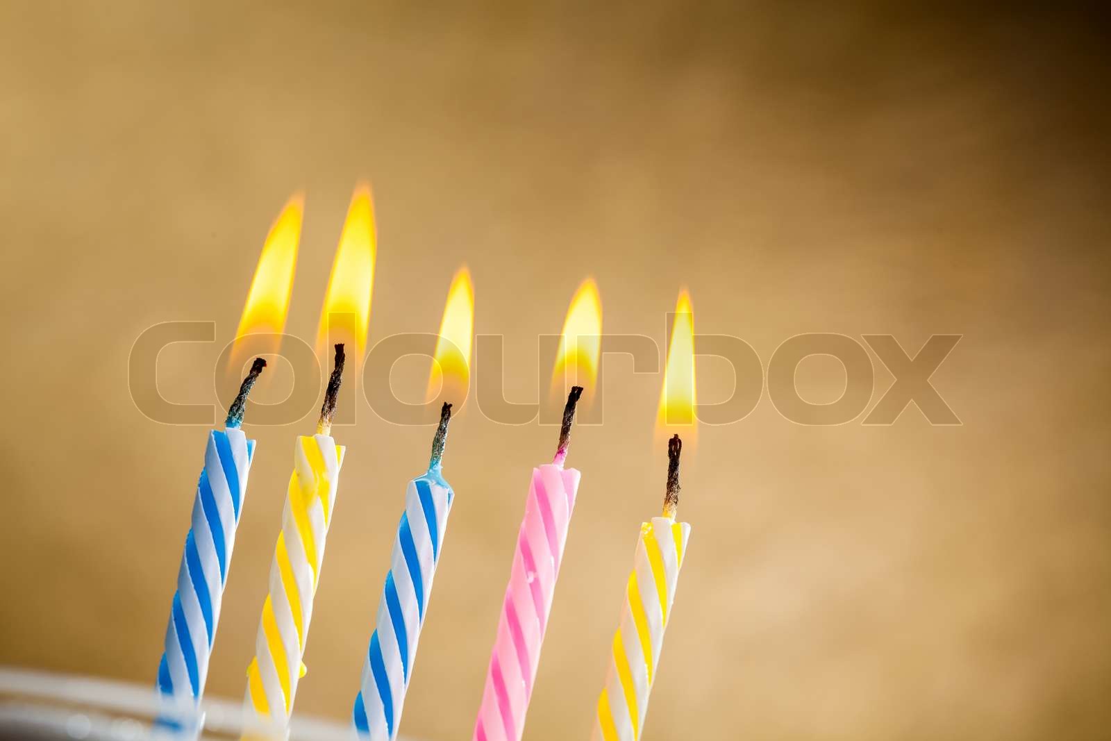 Burning birthday candles | Stock image | Colourbox