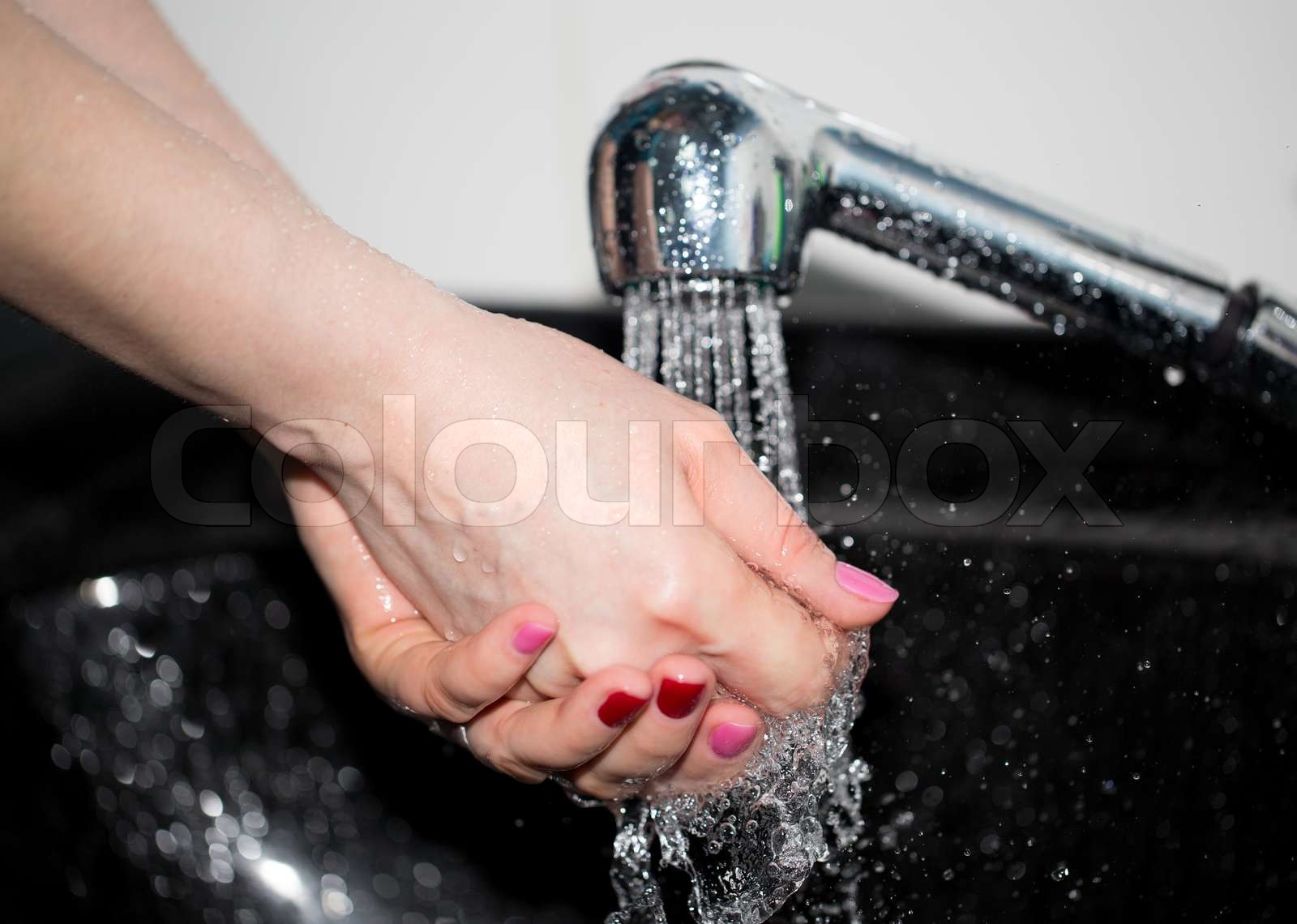 hand washing with tap water | Stock image | Colourbox