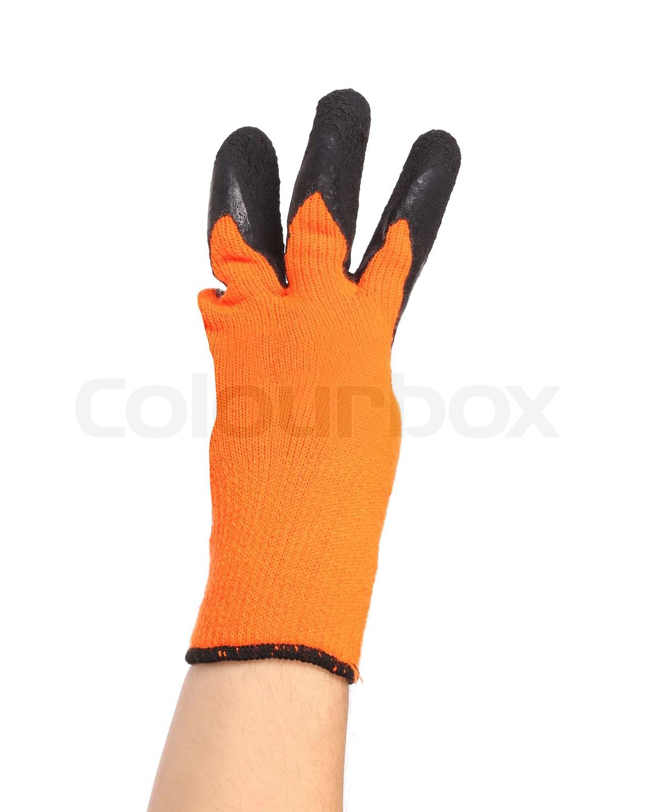 Hand in Gummihandschuh zeigt drei. | Stock Bild | Colourbox