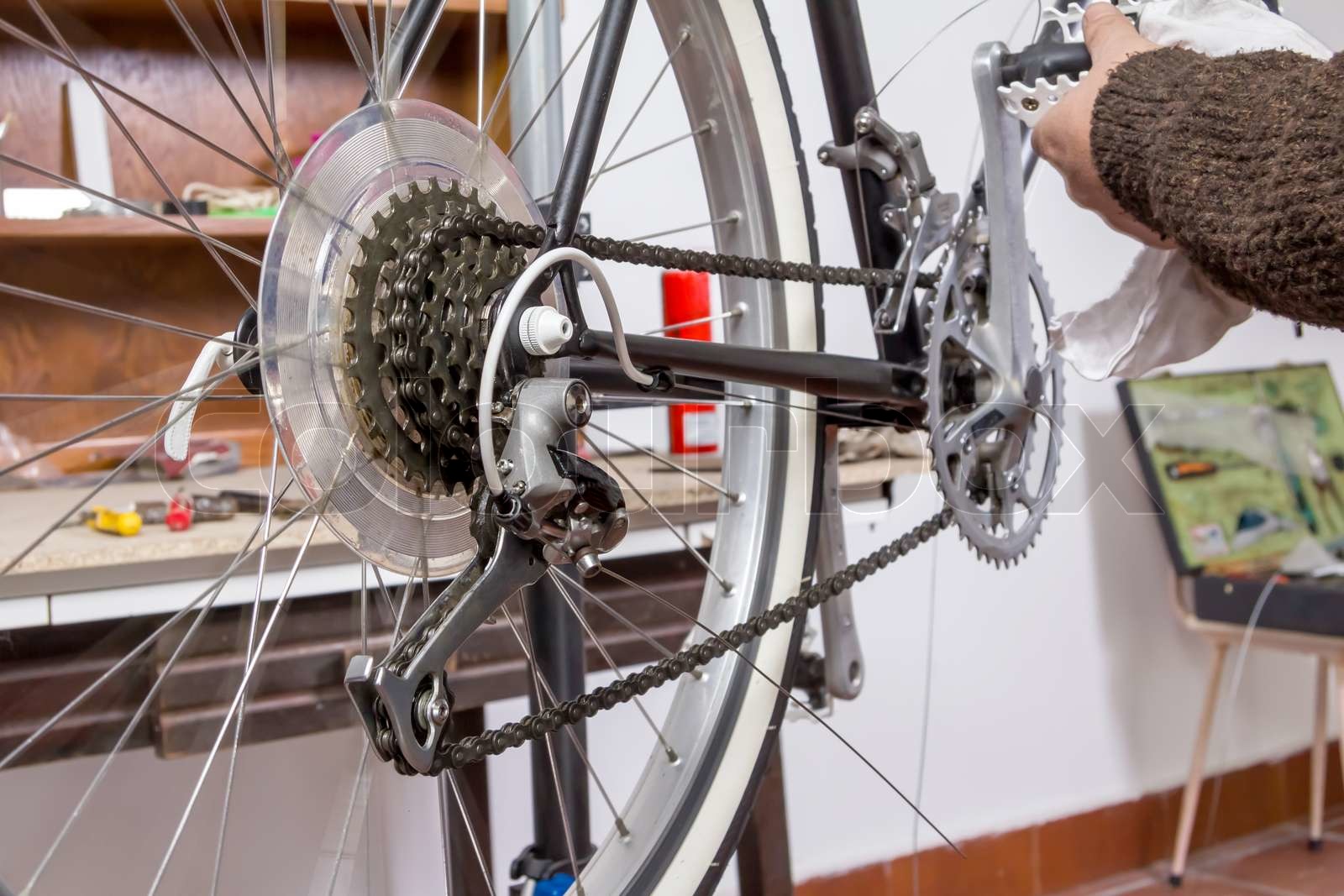 Real bicycle mechanic repairing custom fixie bike Stock image Colourbox