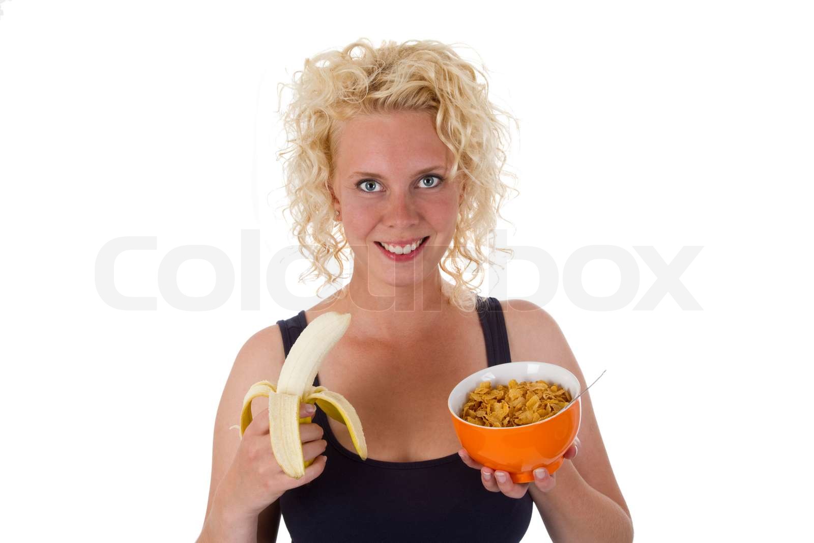 Junge Frau mit Banane und cornflakes | Stock Bild | Colourbox Junge Frau mit Banane und cornflakes | Stock Bild | Colourbox