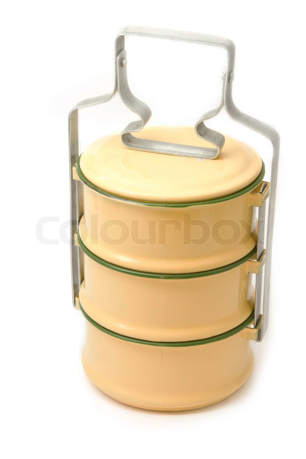 Yellow metal carrier tiffin, thai food carrier Stock image Colourbox