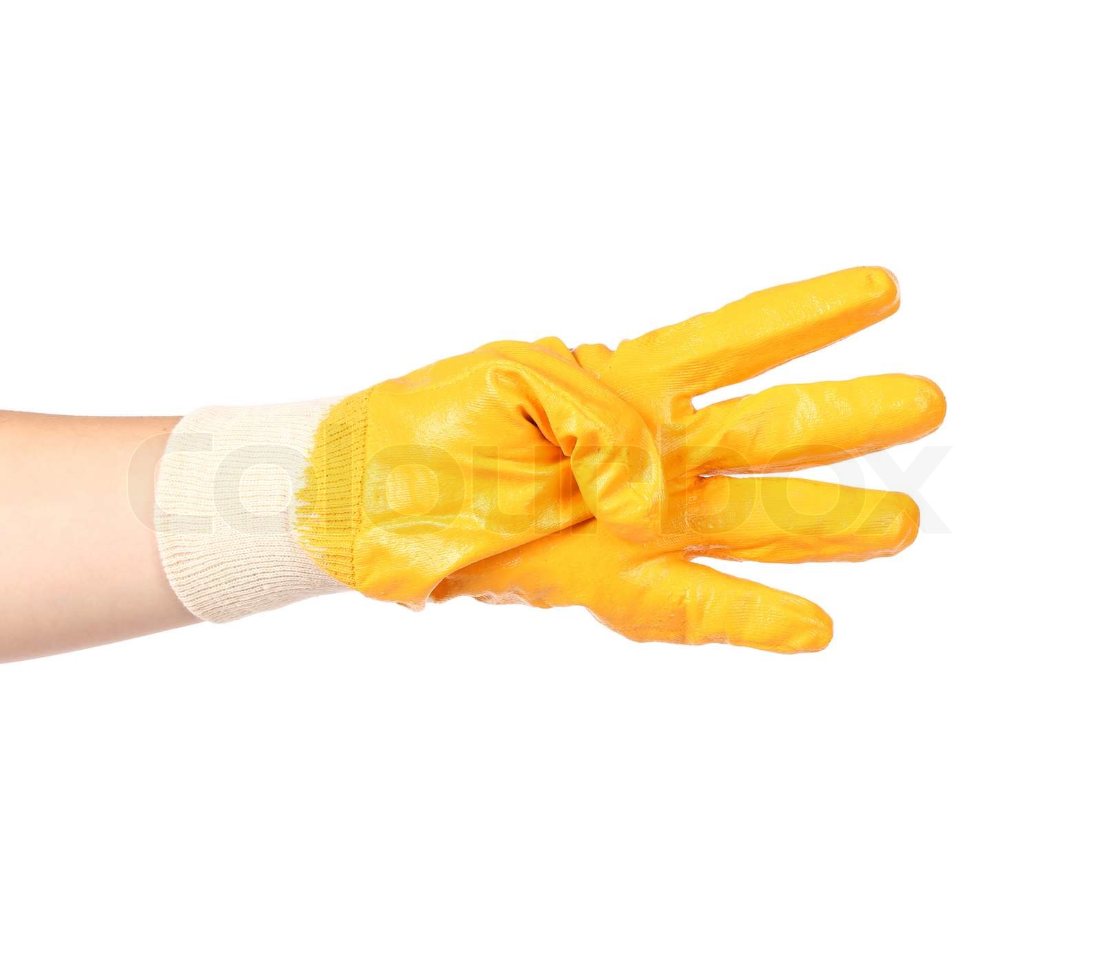 Hand in rubber glove showing four. Stock image Colourbox