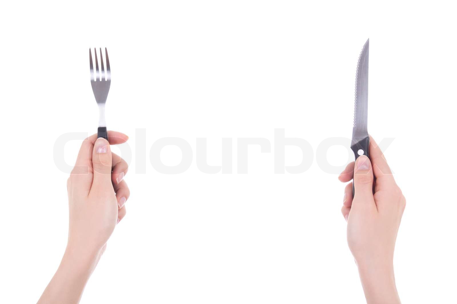 female hands with fork and knife isolated on white Stock image