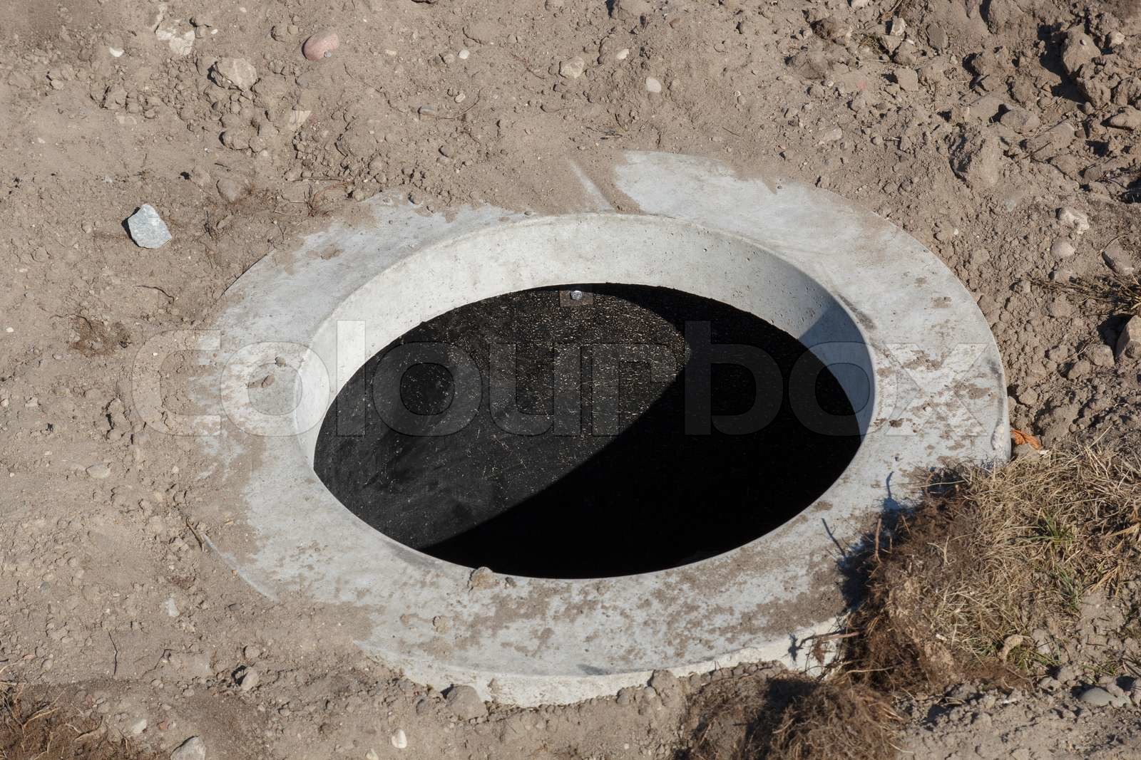 sewer-hole-in-a-construction-site-stock-image-colourbox