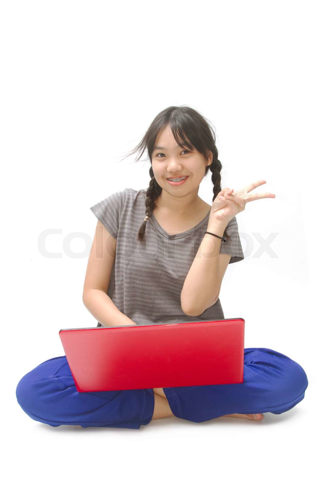asian girl with computer | Stock image | Colourbox