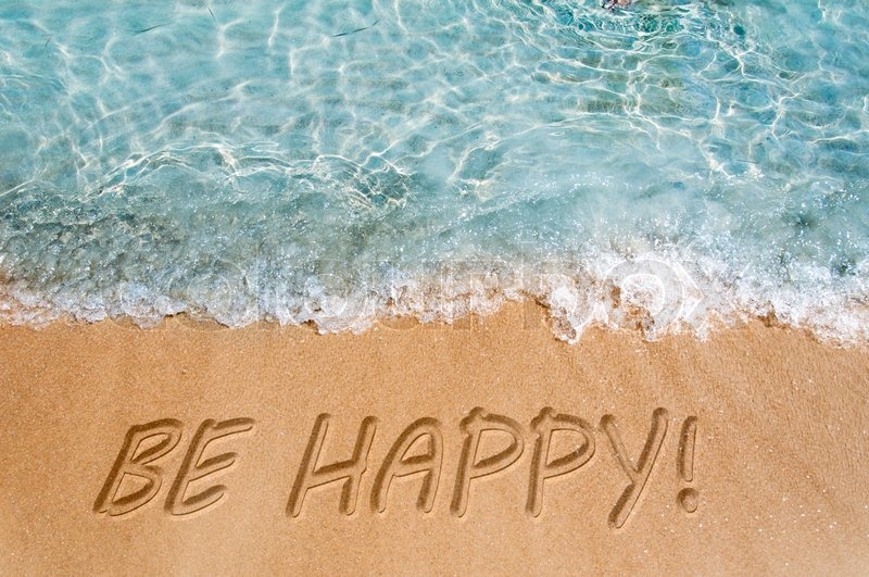 Be happy word sign on the beach sand | Stock image | Colourbox