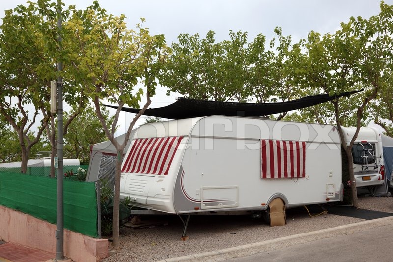 Caravan on a camping site in Spain Stock image Colourbox