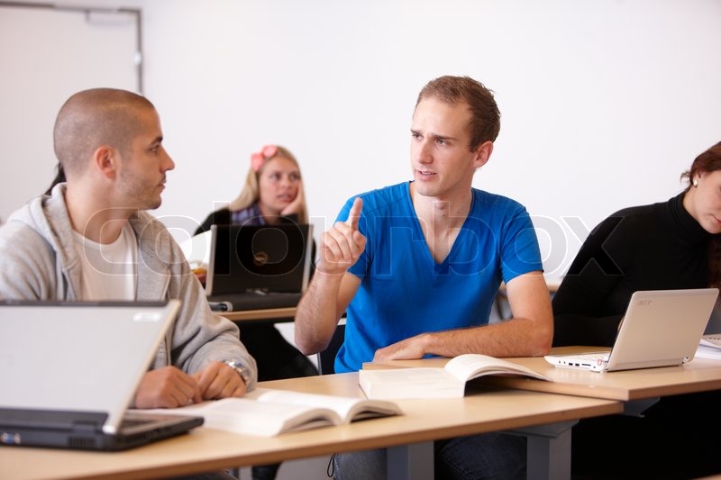 University students exchanging ideas Stock image Colourbox