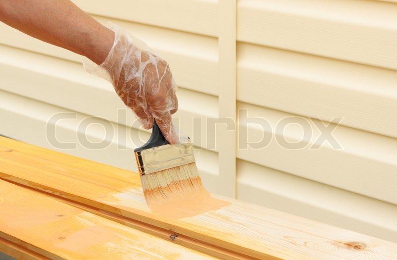 Painting bare wood Stock image Colourbox