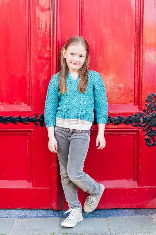 little girl wearing shoes