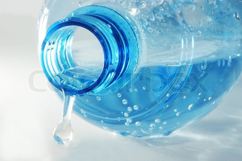 Bottle mineral water with water drops Stock image Colourbox