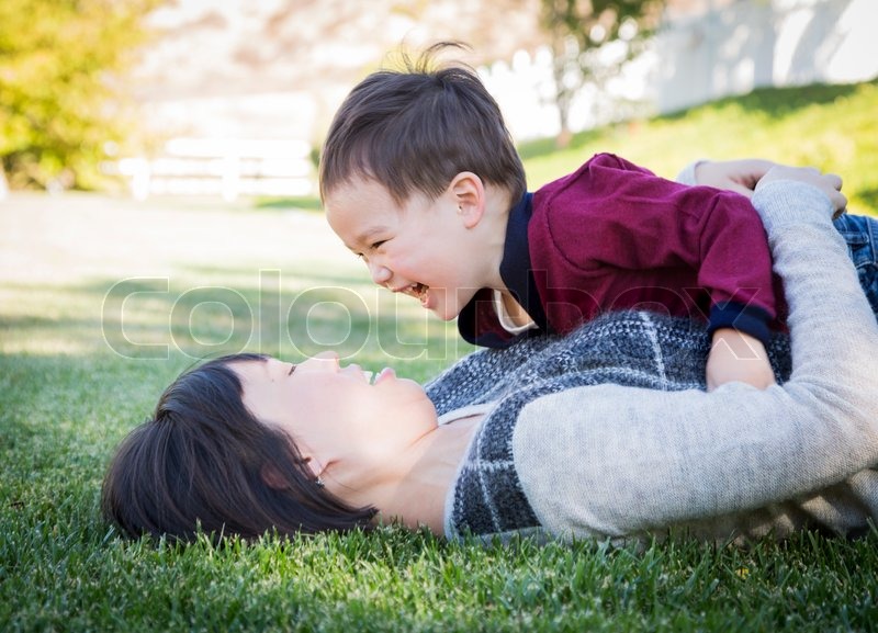 Happy Asian Mother And Daughter Having Fun Outdoor