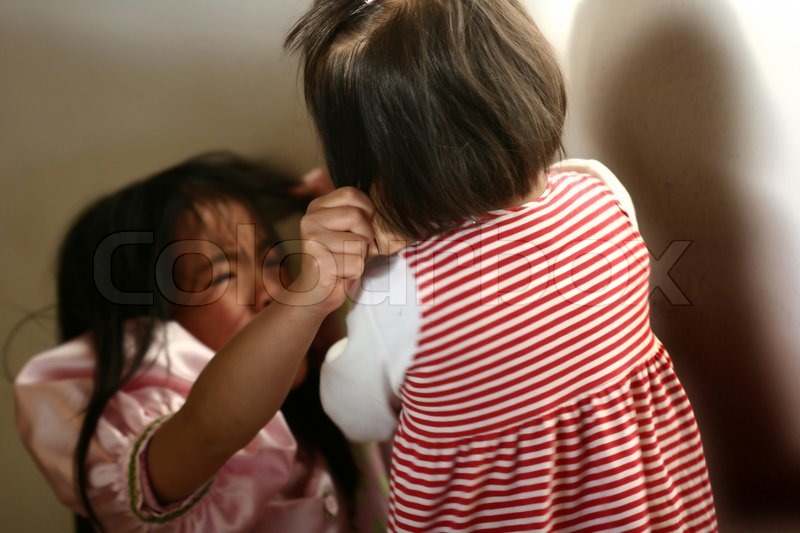 Sisters fighting | Stock image | Colourbox