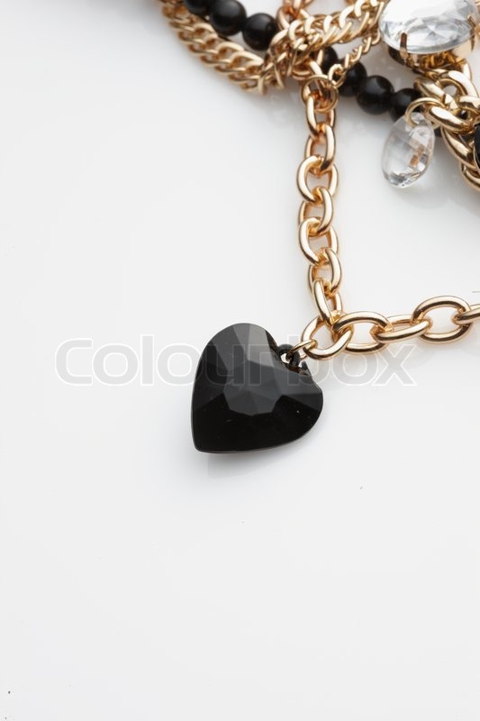 Gold necklace with precious heart 