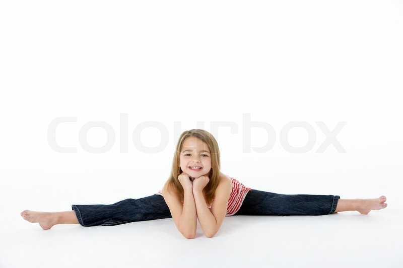 Young Girl In Gymnastic Pose Doing Splits | Stock Photo | Colourbox