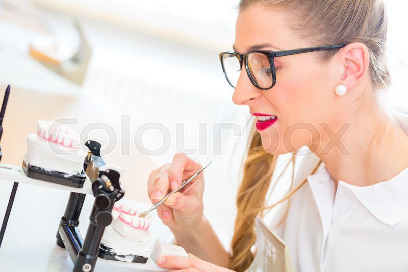 Female dental technician or Stock image Colourbox