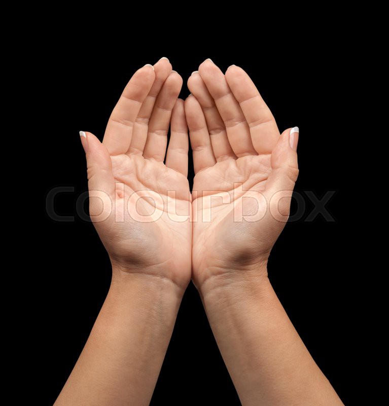 Open hands on a black background | Stock image | Colourbox