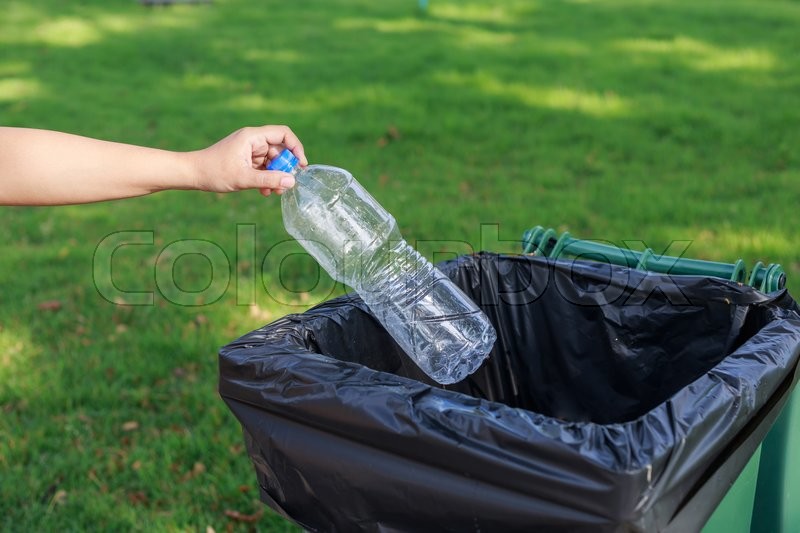 Human Hand Holding Empty Bottle Plastic Into The Tras vrogue.co