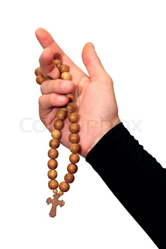 Rosary in his hand | Stock image | Colourbox