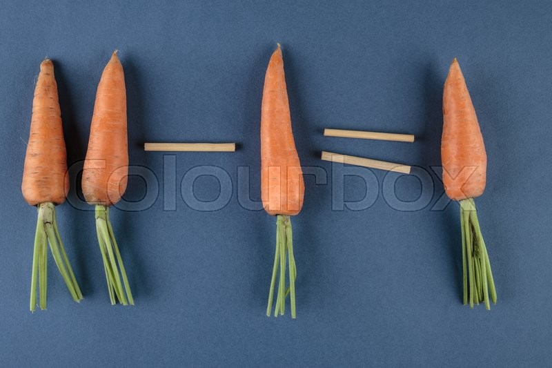 Carrots and school mathematics with | Stock image | Colourbox