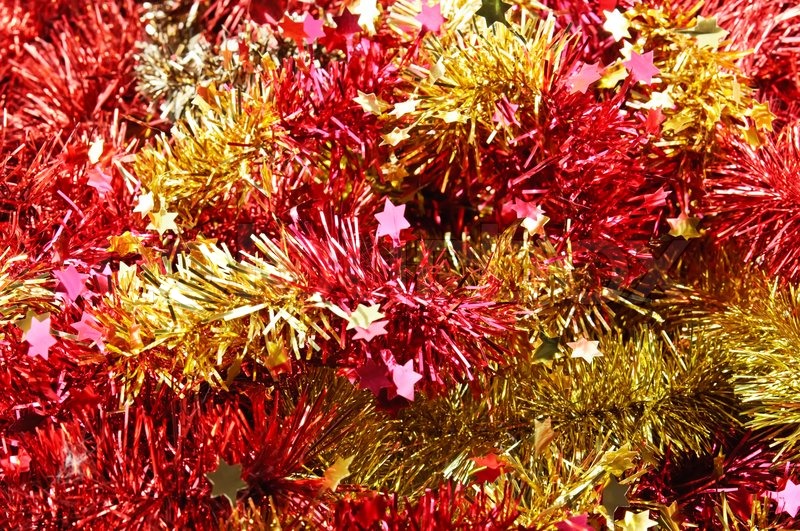 background from red and yellow christmas tinsel stock background from red and yellow christmas tinsel stock