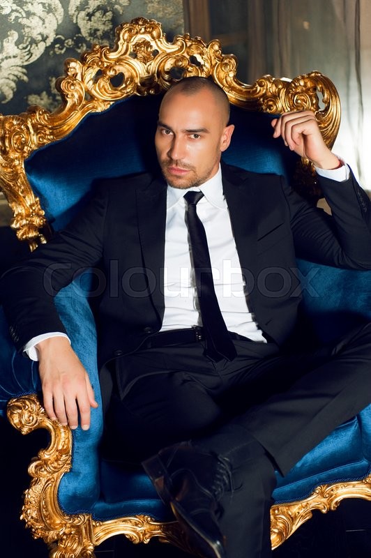 Handsome young muscular man wearing 