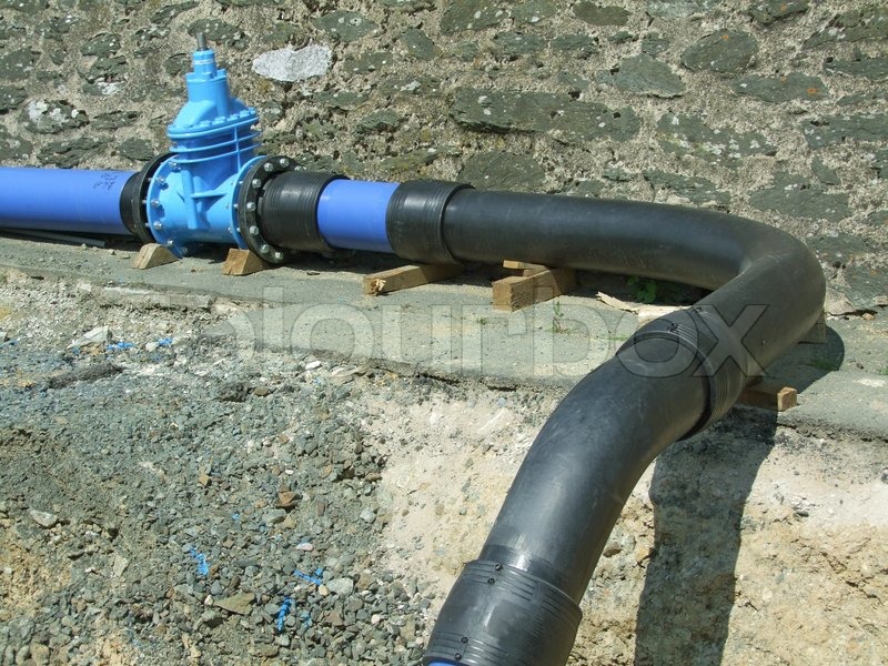 Water pipe construction being laid. Stock image Colourbox