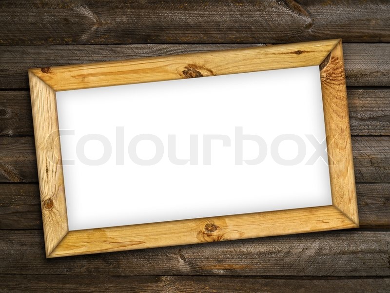 Photo of frame over dark wooden | Stock Photo | Colourbox