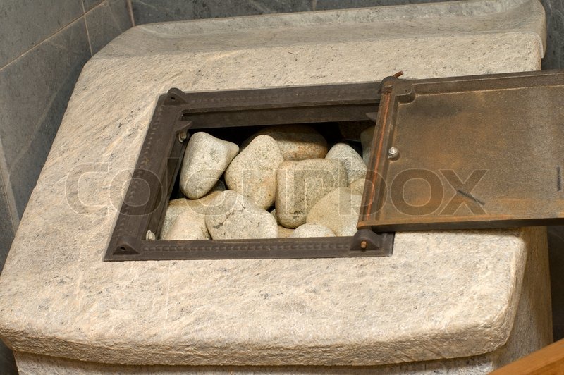 Stones zum Öffnen der Tür des Bades Ofen. | Stockfoto | Colourbox