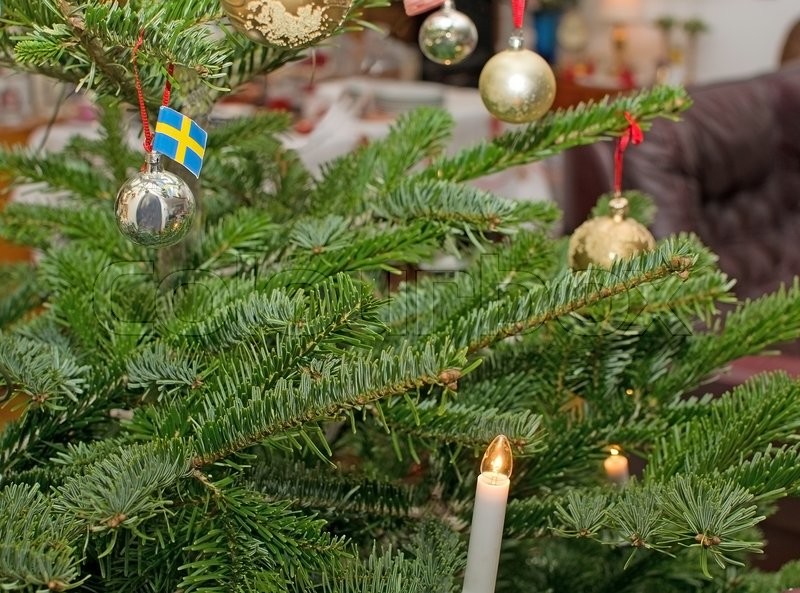 christmas tree with swedish flag lights and baubles traditional decoration closeup sweden in december stock photo - Traditional Swedish Christmas Decorations christmas tree with swedish flag lights and baubles traditional decoration closeup sweden in december stock photo - Traditional Swedish Christmas Decorations
