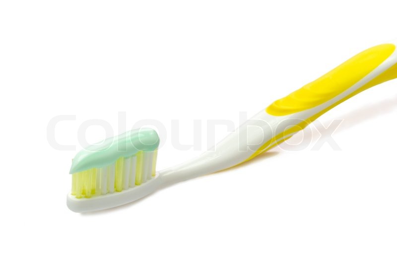 Yellow toothbrush with toothpaste Stock image Colourbox
