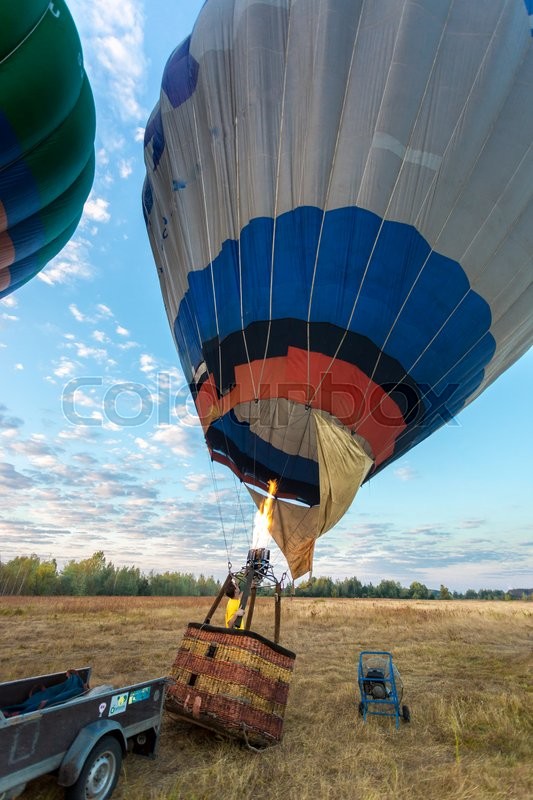pilot filling balloon with hot air from propane heater | Stock image |  Colourbox