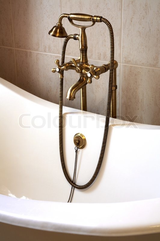 Die schöne Bronze Wasserhahn und weiße | Stock Bild | Colourbox