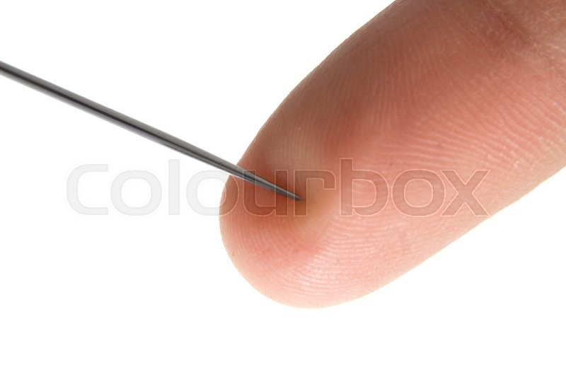 Needle with finger isolated closeup Stock Photo Colourbox