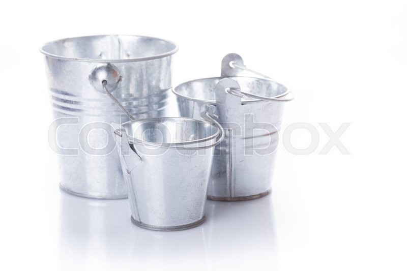 Three different in size empty buckets Stock image Colourbox